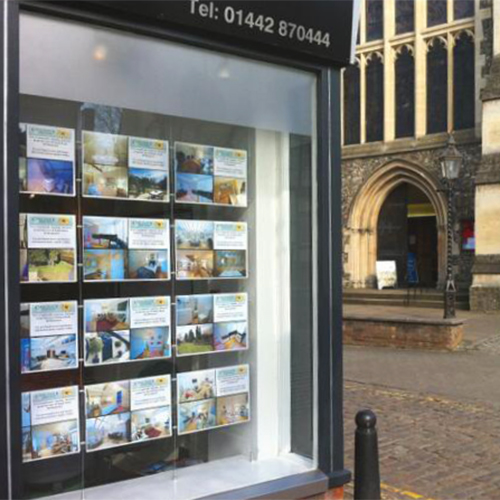 Suspended multi-column A3 landscape display at Cole Flatt & Partners